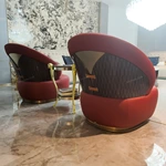 Burgundy Leather Tub Chair with Woven Side Panels and High-Gloss Wood Back